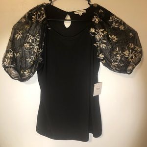 Detailed sleeves black blouse sz M perseption concept